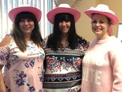Karen Magee, Tami Luxton, & Natasha Raabe showing their support for Breast Cancer Awareness and raising funds to find a cure.